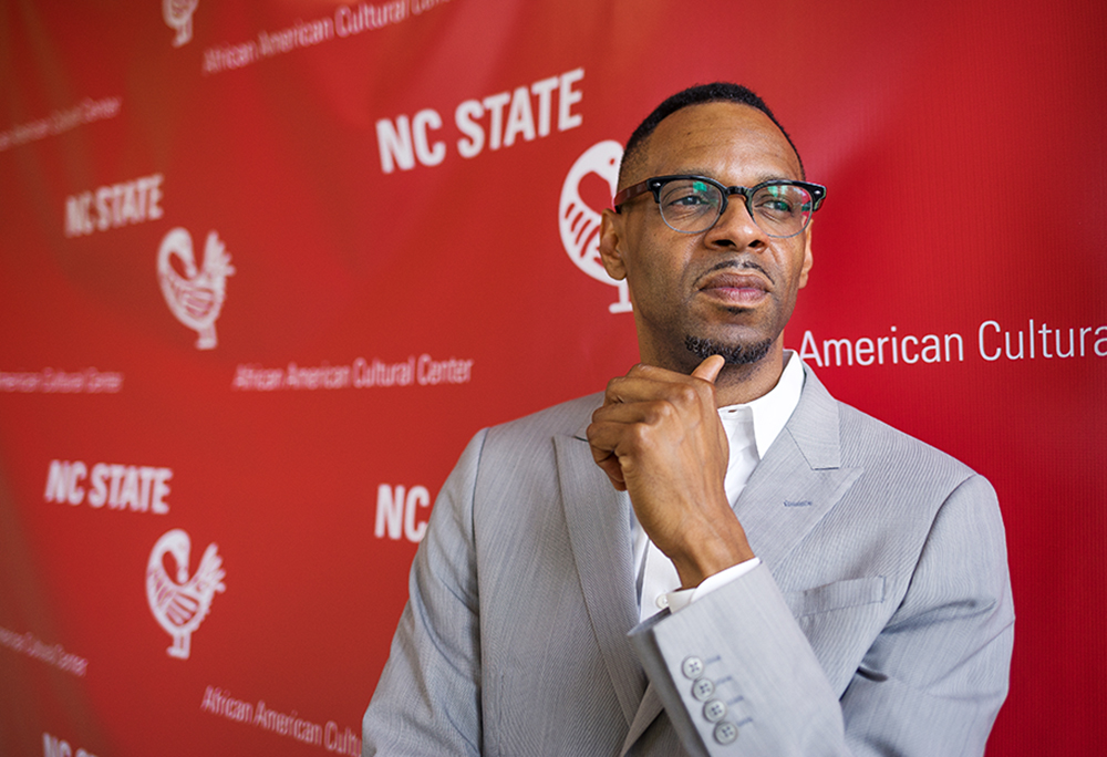 Moses T. Alexander Greene poses in front of the African American Cultural Center.