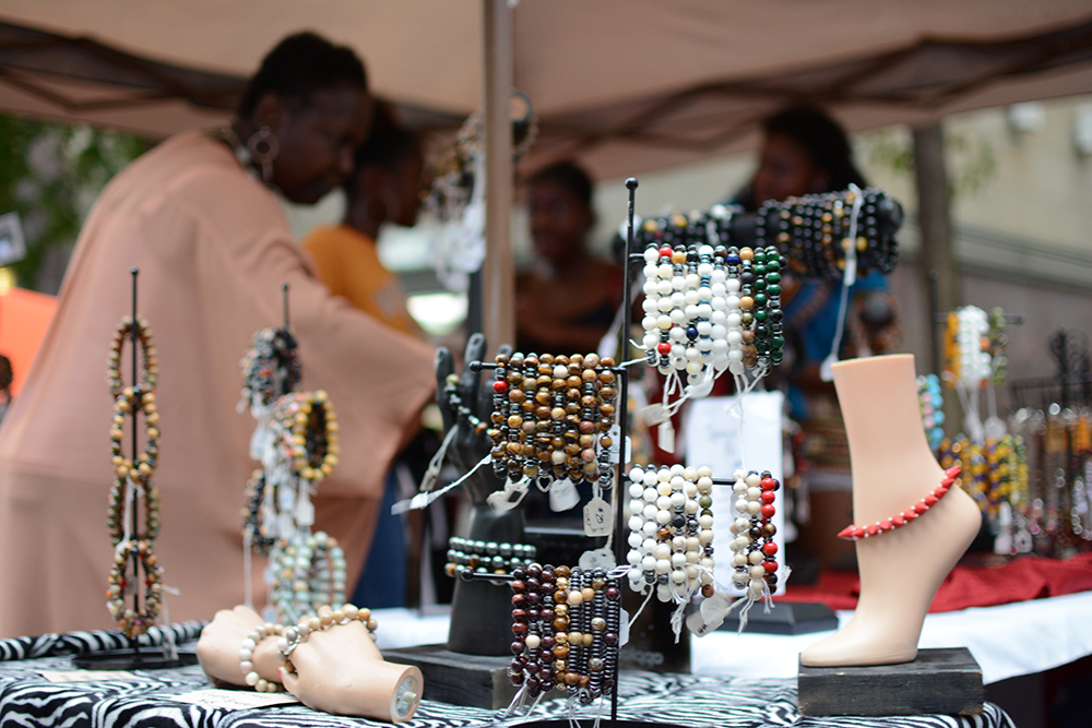 The handmade jewelry by Sadarryle Rhone stands on display for visitors during the African American Culture Festival of Raleigh and Wake County on Saturday, September 1, 2018.